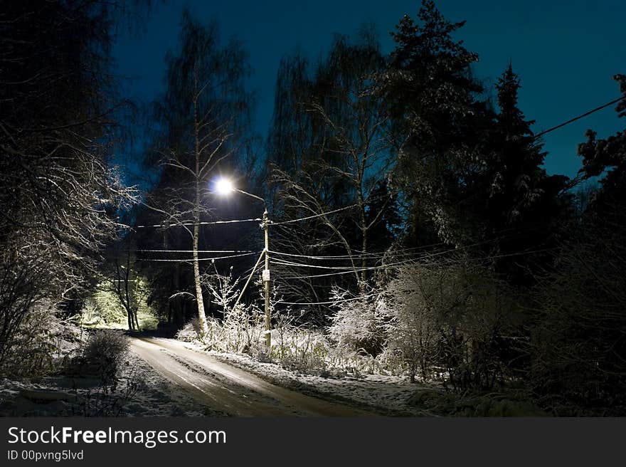 Frozen cityscape, winter night at Moscow suburb, Russia