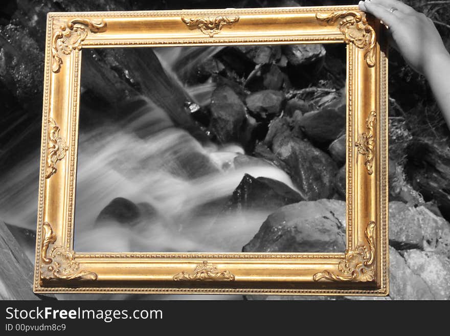 Black and white mountain spring caught in gold frame. Black and white mountain spring caught in gold frame