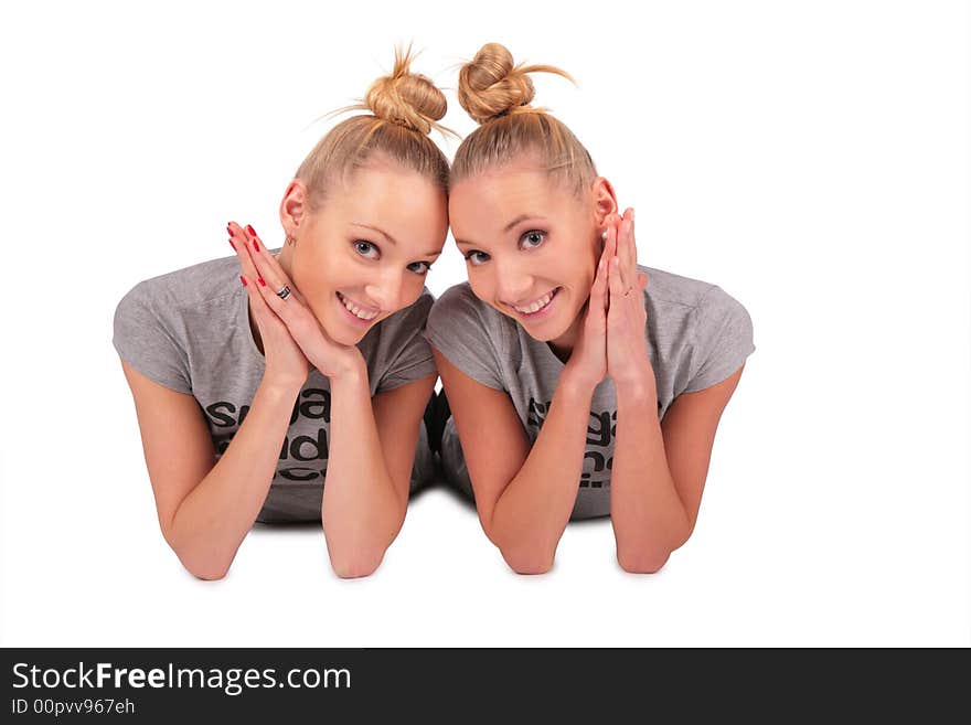 Twin sport girls lying on white 3. Twin sport girls lying on white 3