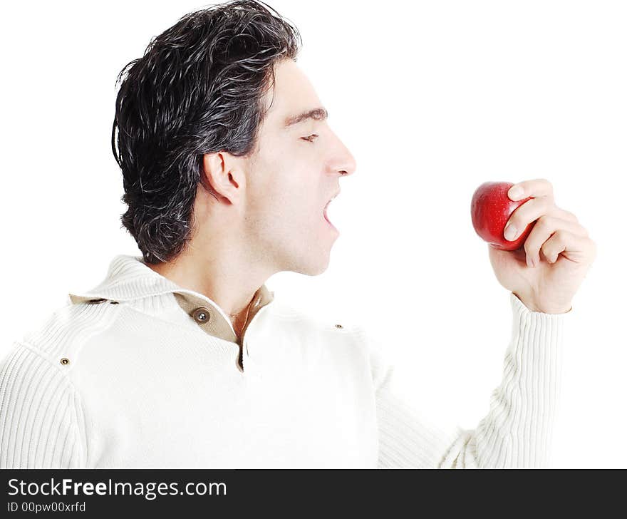 A man is holding fruit in his hands. A man is holding fruit in his hands