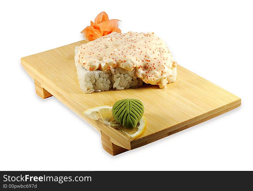 Roll lava maki on the japanese dish isolated on a white background. Roll lava maki on the japanese dish isolated on a white background.