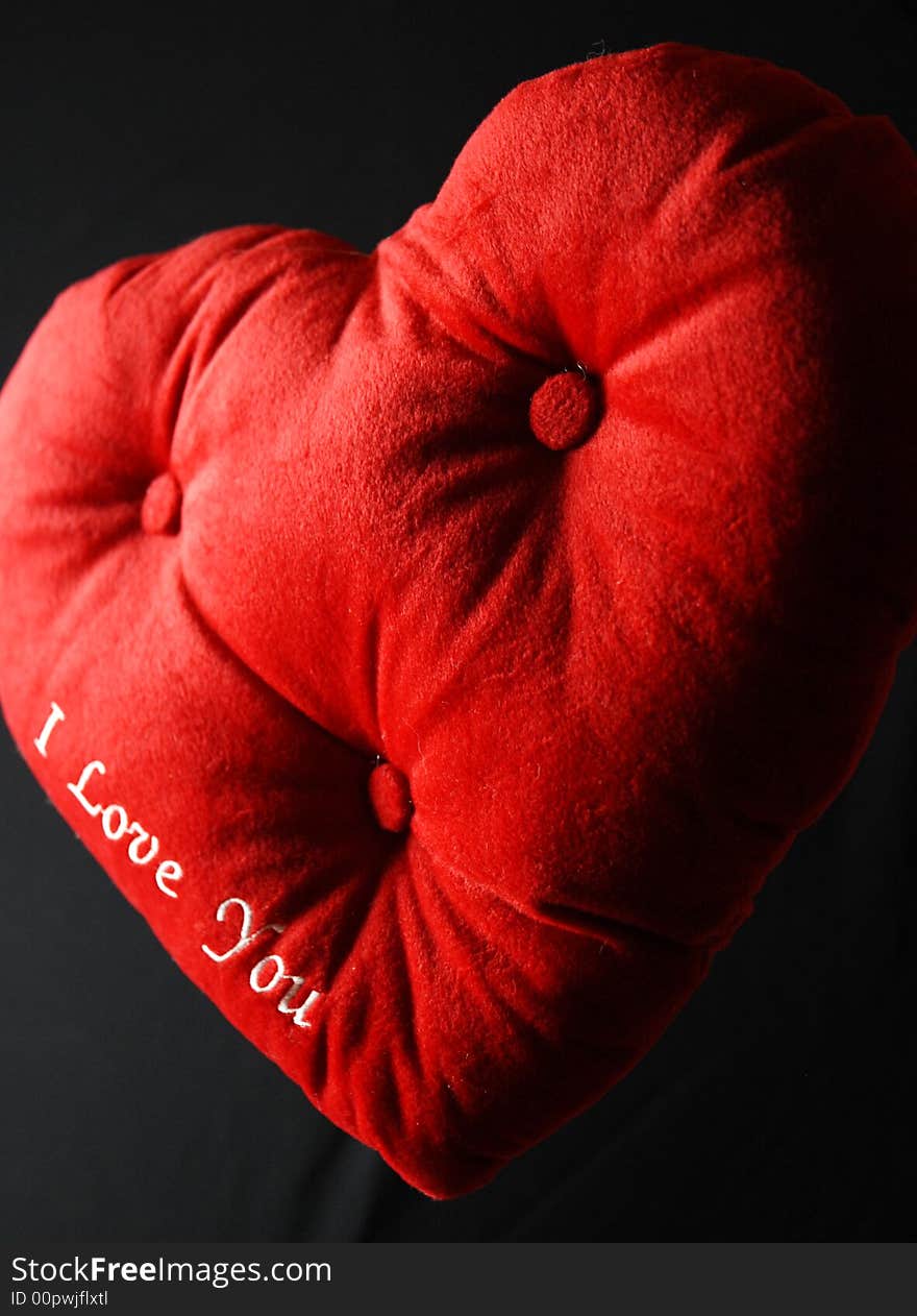 Heart shaped cushion with 'I love you'. Heart shaped cushion with 'I love you'