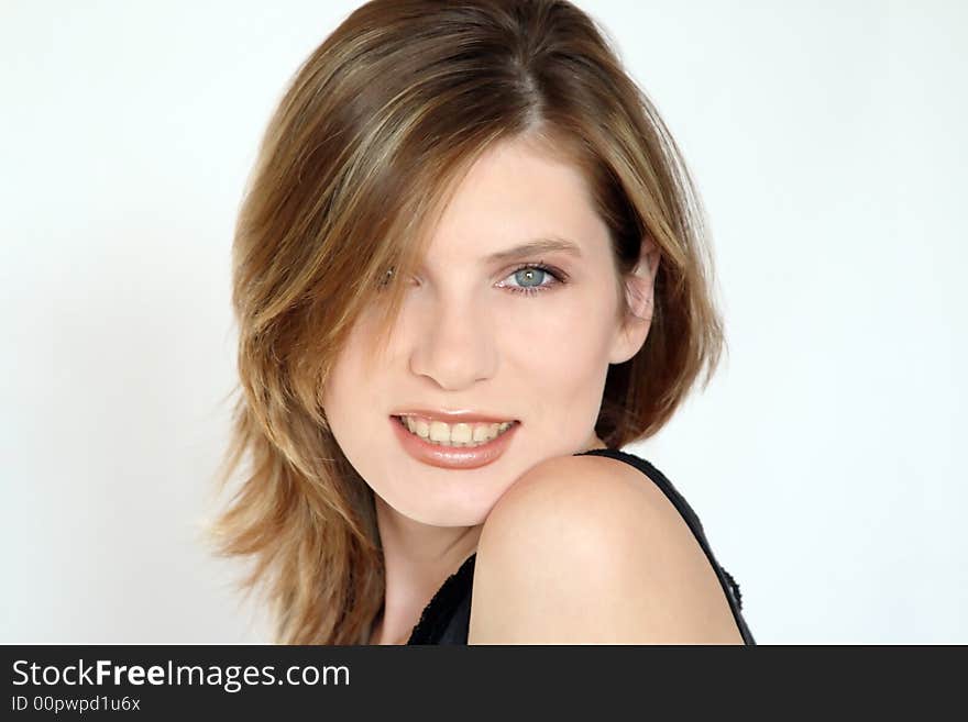 Portrait of the beautiful smiling girl on a background. Portrait of the beautiful smiling girl on a background