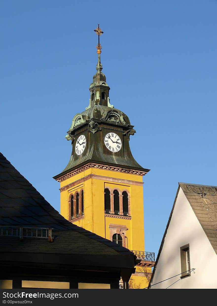 A spire int front of a blue sky on an January afternoon. A spire int front of a blue sky on an January afternoon.