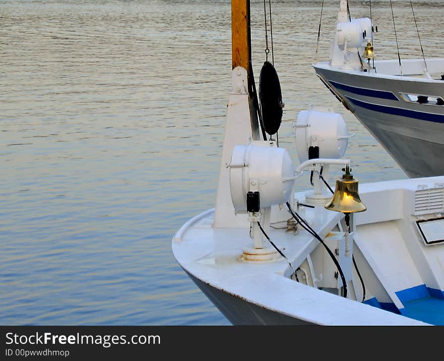 River. Evening. On the river ships cost at moorage. Solnichnyy a ray gleams in a ship bell. River. Evening. On the river ships cost at moorage. Solnichnyy a ray gleams in a ship bell.