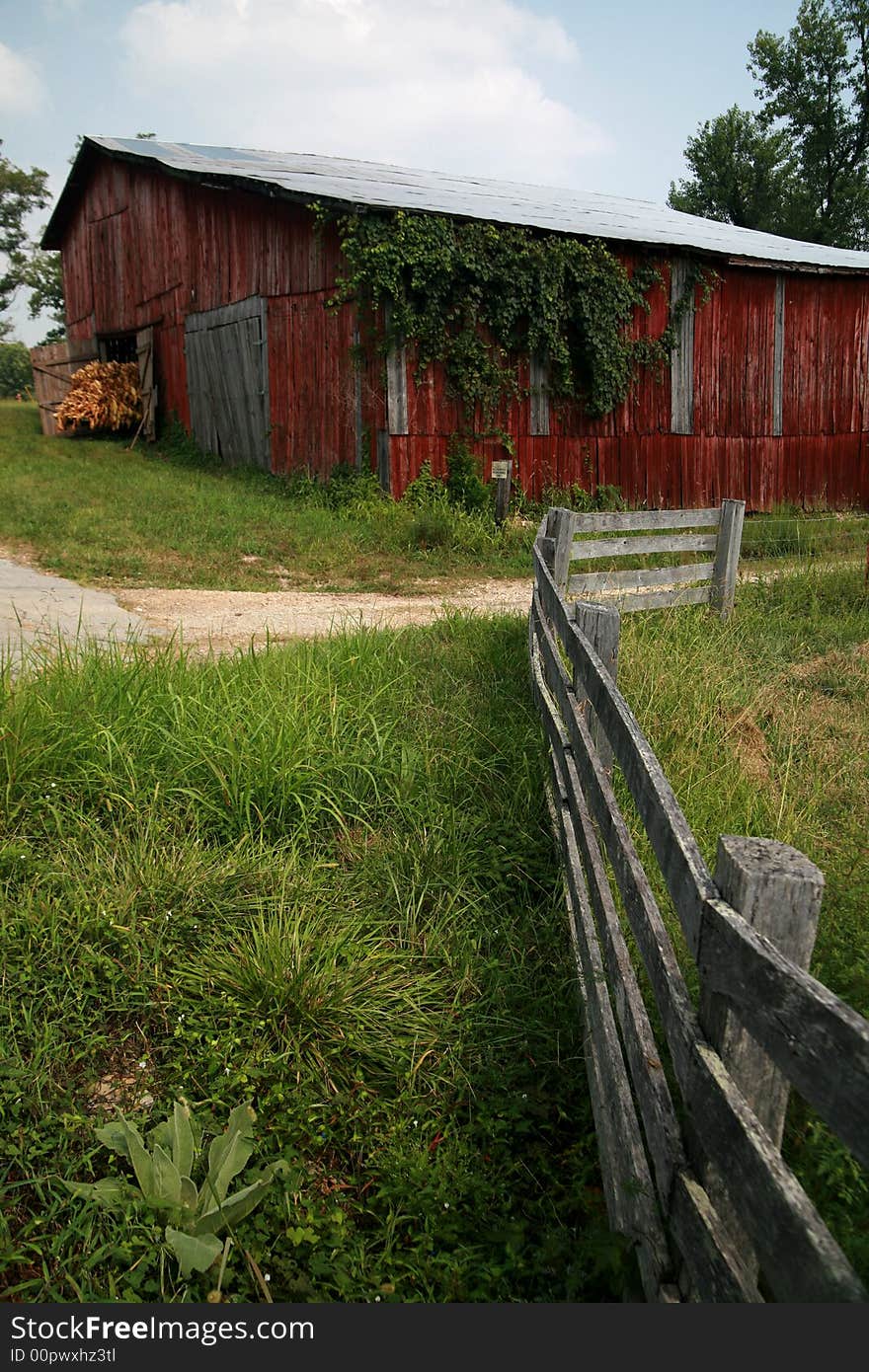 A rurL Frm in CentraL Tennessee, shows its age but keepson working. A rurL Frm in CentraL Tennessee, shows its age but keepson working