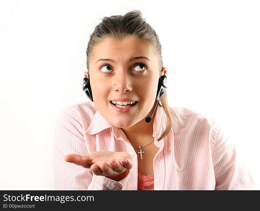 Young woman working as customer service in rose shirt with microphone