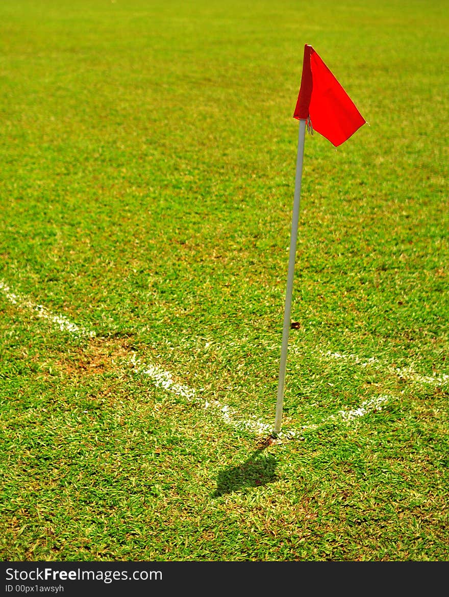 A corner flag in the game of soccer. A corner flag in the game of soccer