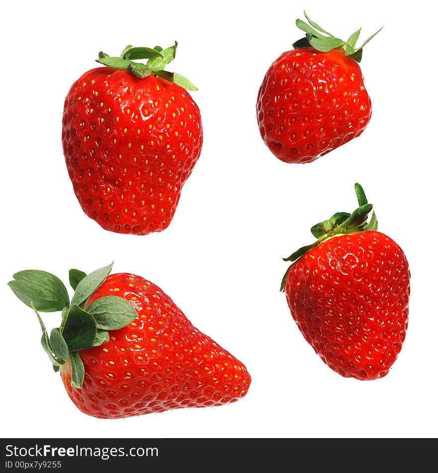 Four different strawberries isolated on white background. Four different strawberries isolated on white background