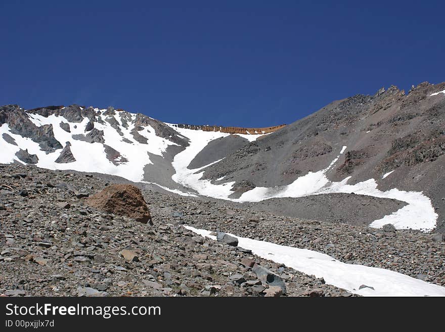 Mt Shasta from the summit trail looking up at the red banks