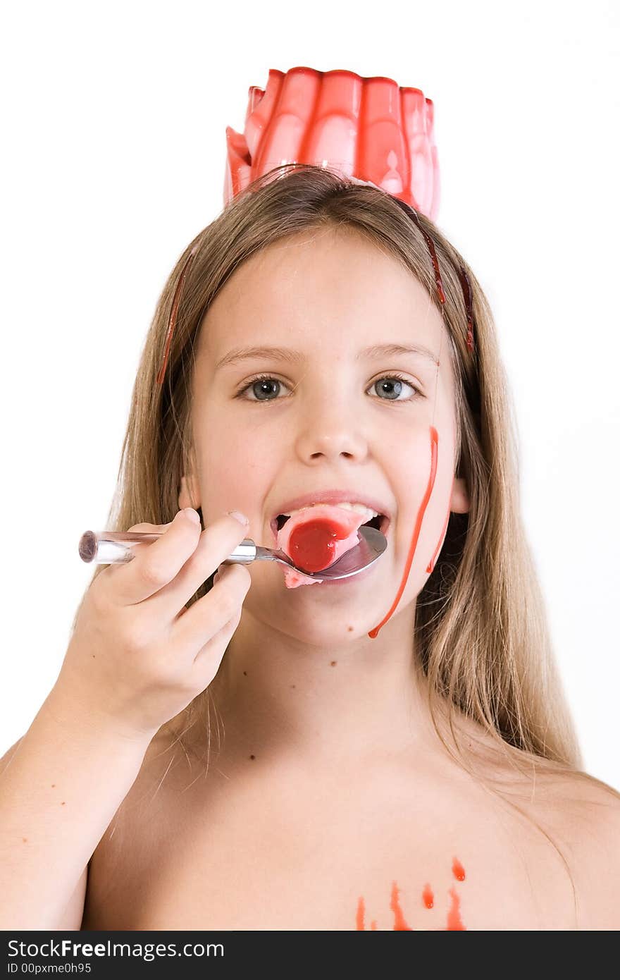 Blond child with desert on her head eating