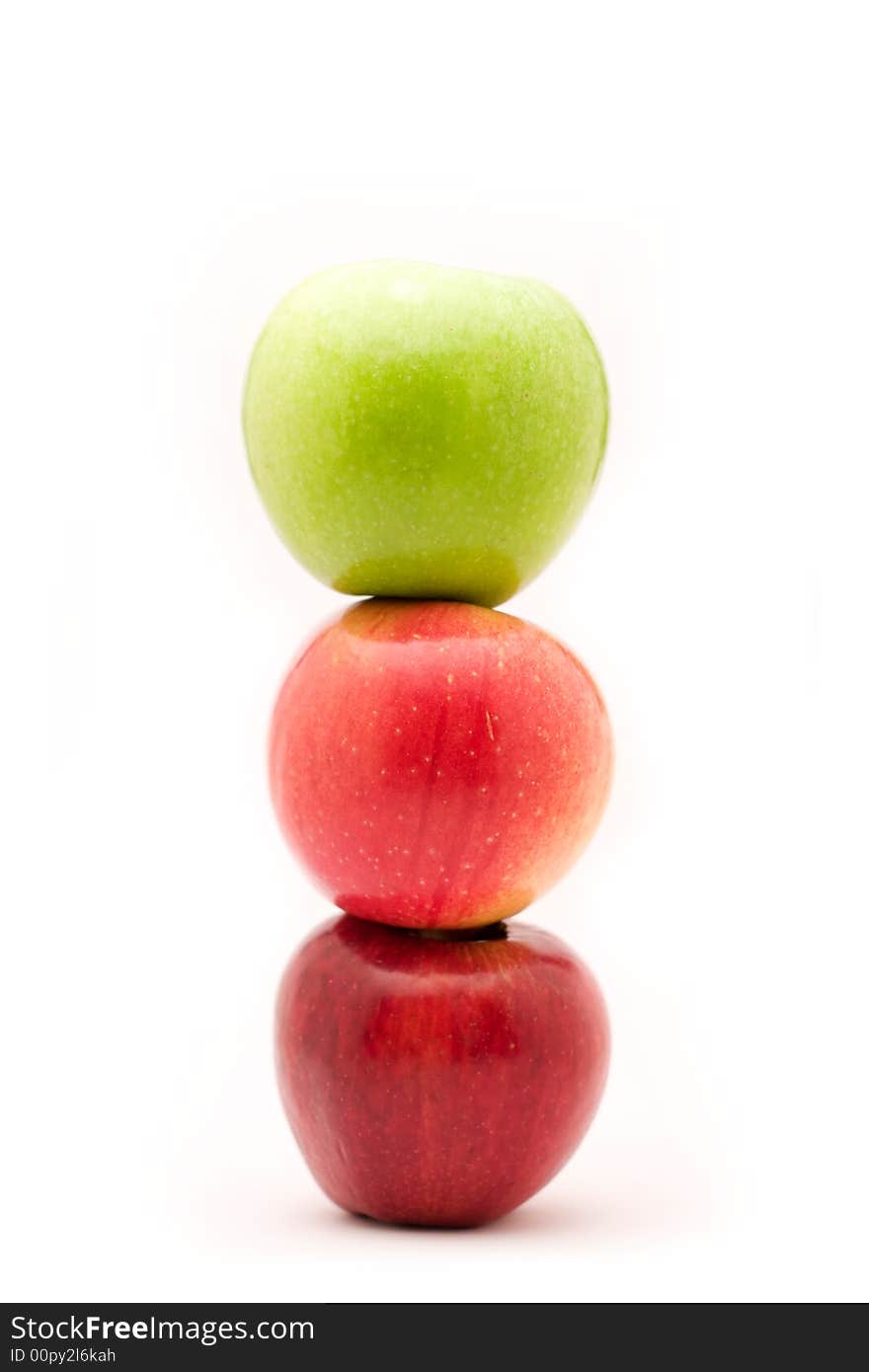 Three apples on white background