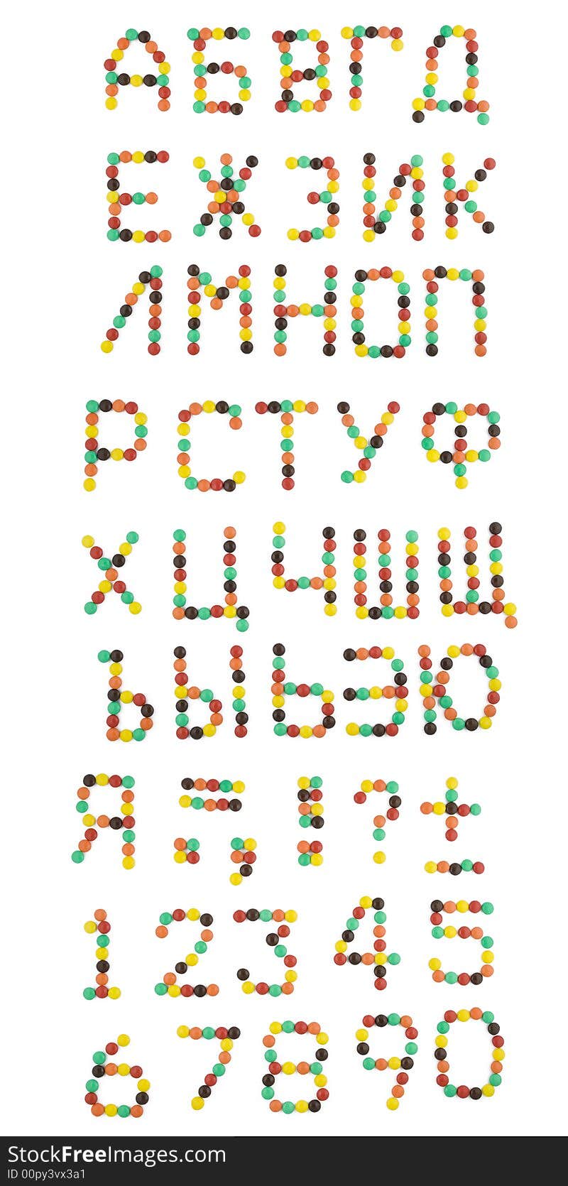 Cyrillic alphabet from colorful candies isolated on white background