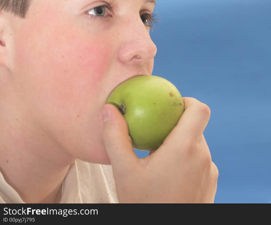 The young men eat green apple . The young men eat green apple .