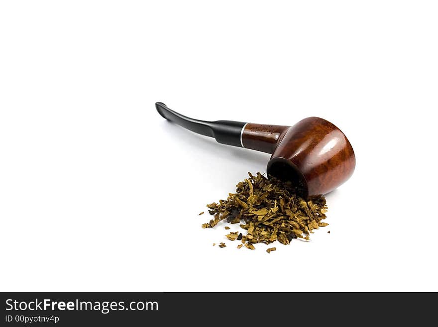 Tobacco-pipe and heap of tobacco over white background