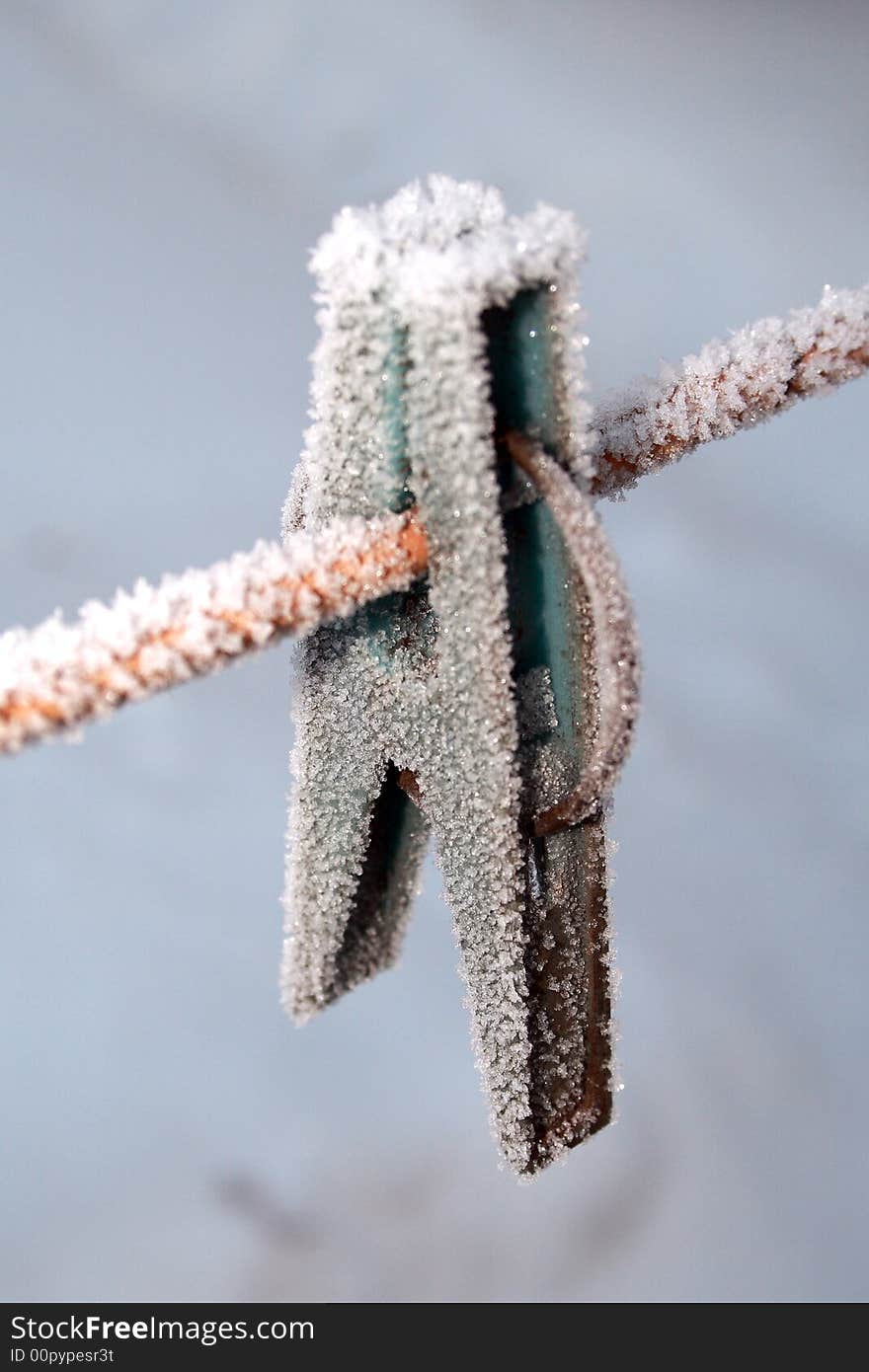 Hoarfrost on the clip for dry the linen. Hoarfrost on the clip for dry the linen