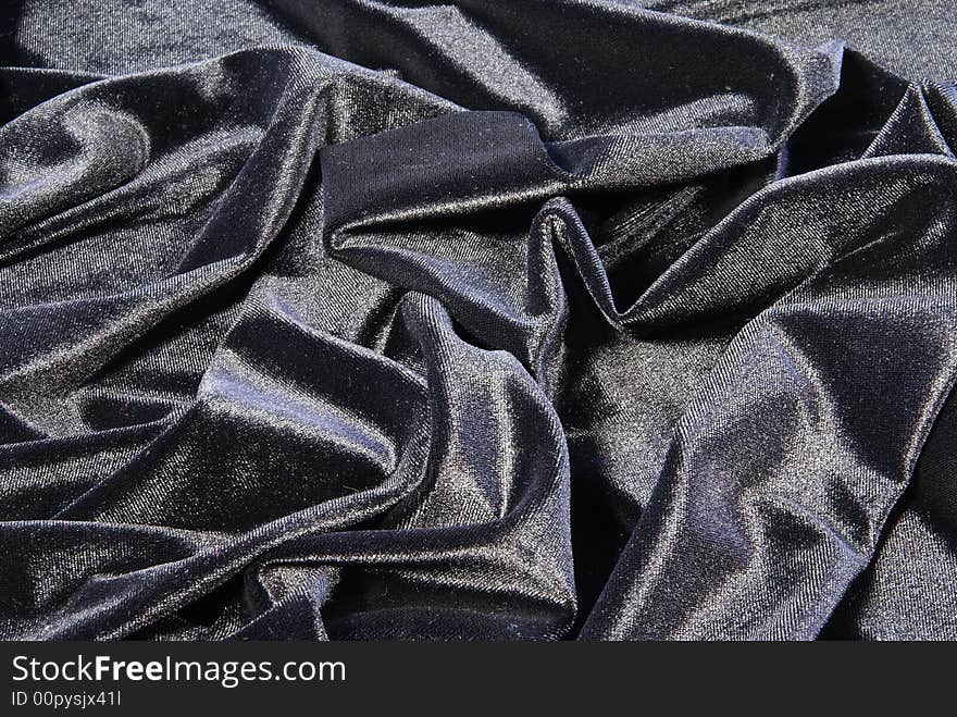 Black satin or velvet background. Black satin or velvet background