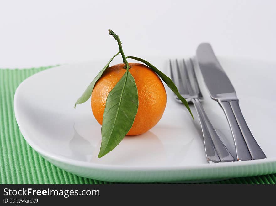 Mandarine on a plate