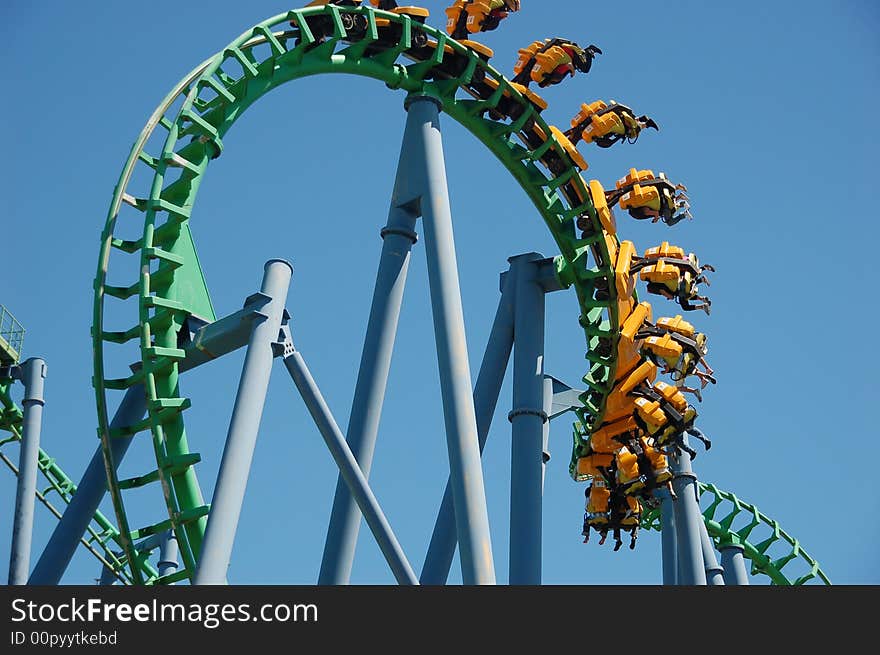 People enjoying a ride in a sidewinder. People enjoying a ride in a sidewinder