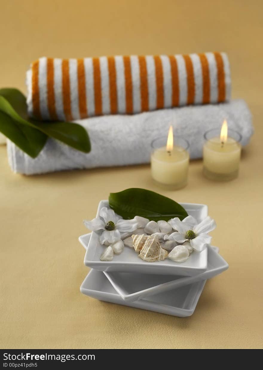 Candles, towels and spa stones. Candles, towels and spa stones