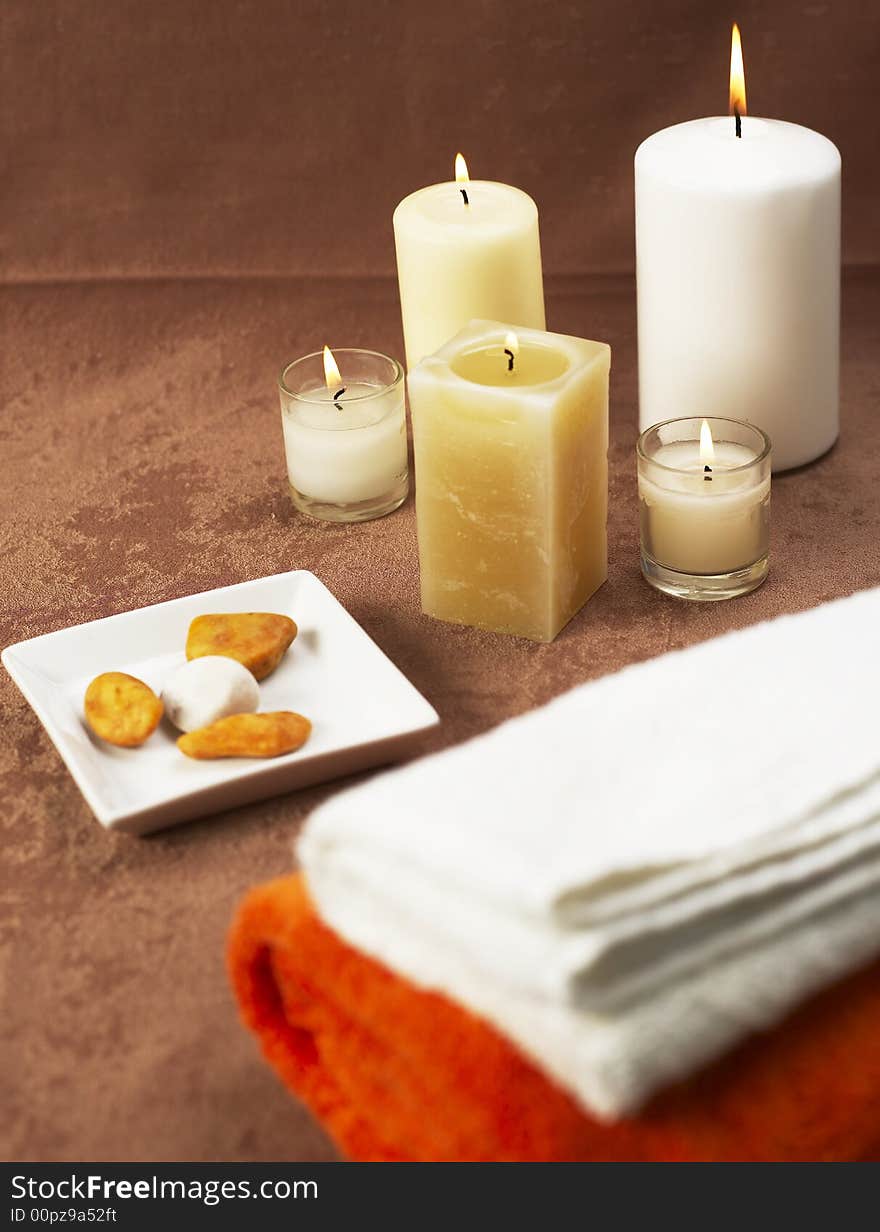 Candles, towels and spa stones. Candles, towels and spa stones