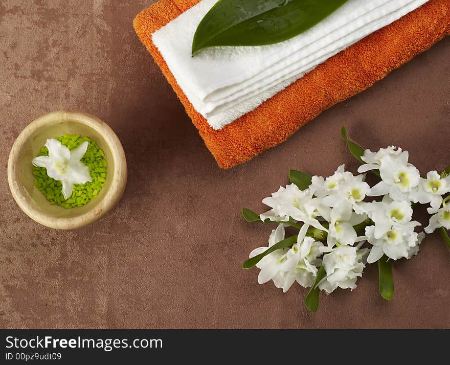 Flowers, towels and spa stones. Flowers, towels and spa stones