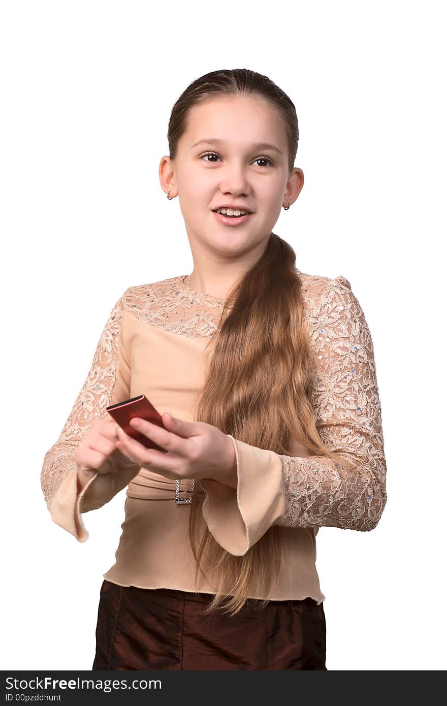 The girl the teenager with a mobile phone, on a white background. The girl the teenager with a mobile phone, on a white background.