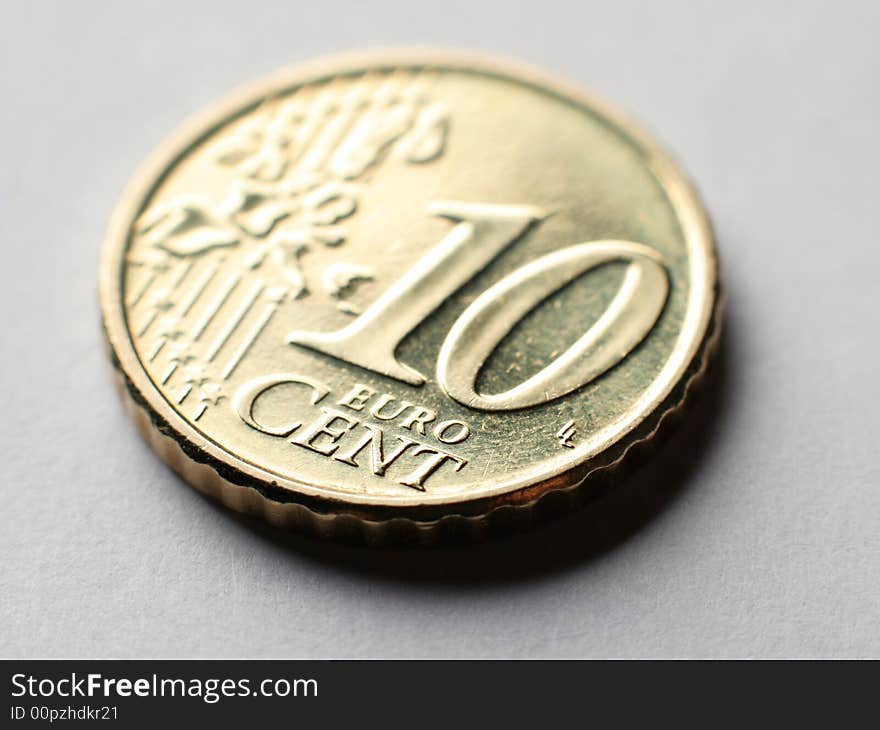 Macro photo of coin 10 euro cent. With perspective out-of-focus. Macro photo of coin 10 euro cent. With perspective out-of-focus.