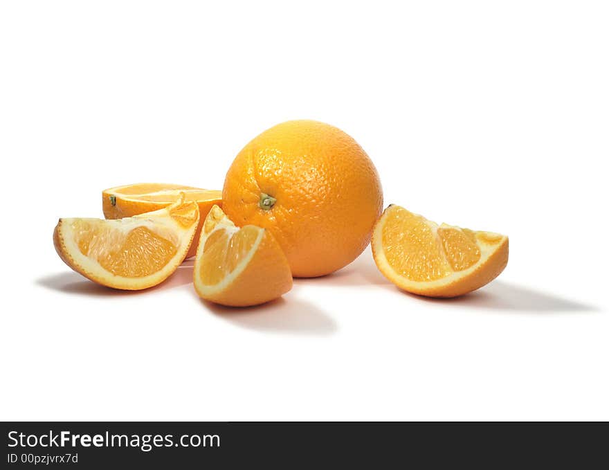 Orange and incised orange with its shadow on white background. Orange and incised orange with its shadow on white background