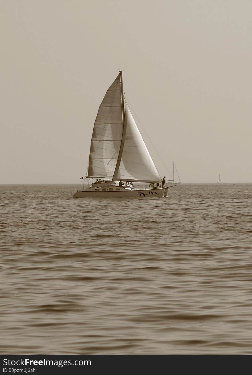 Sailer on the sea in black and white colors