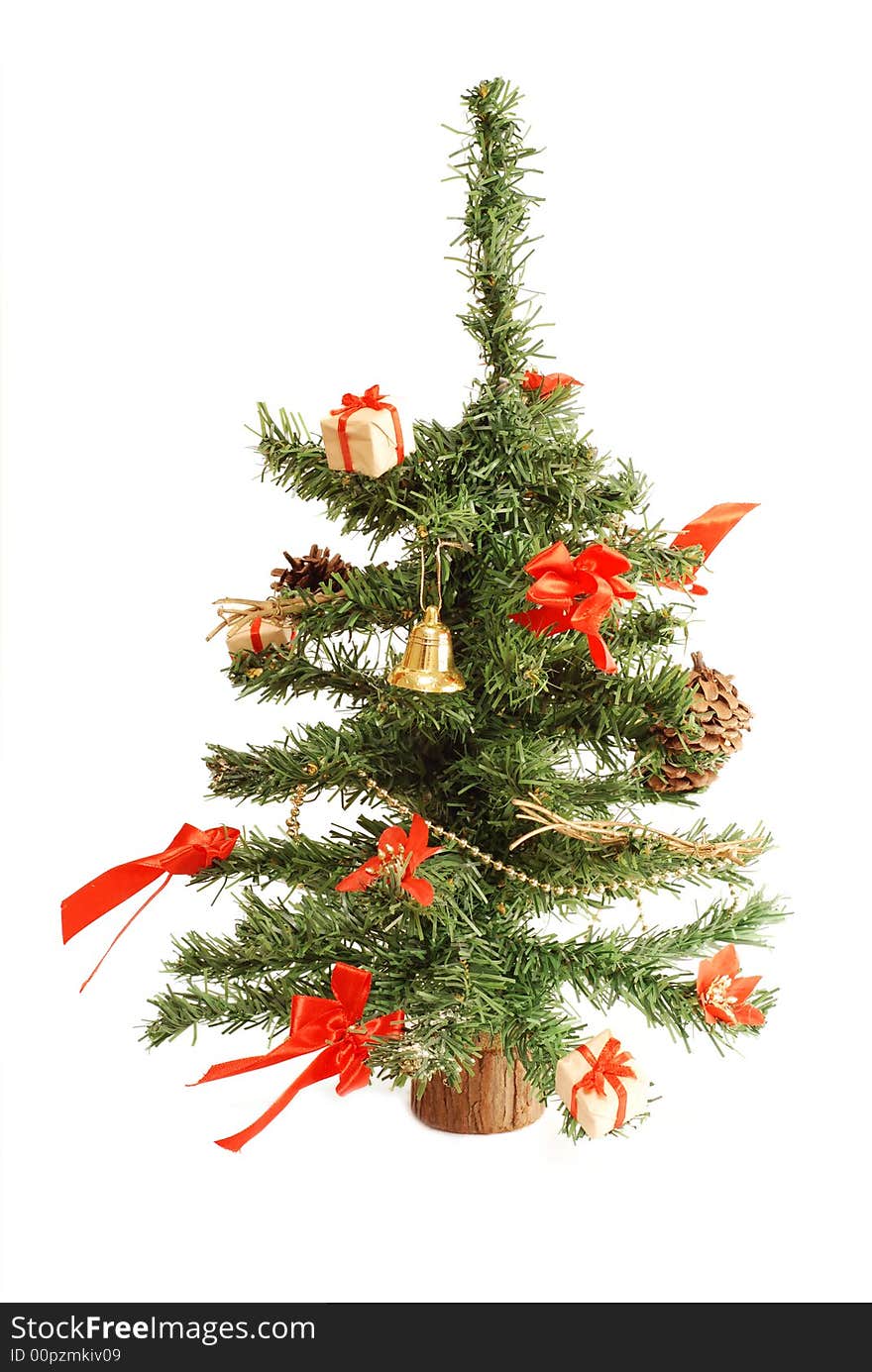 Little artificial christmas tree with bows, ribbons, bells. Little artificial christmas tree with bows, ribbons, bells