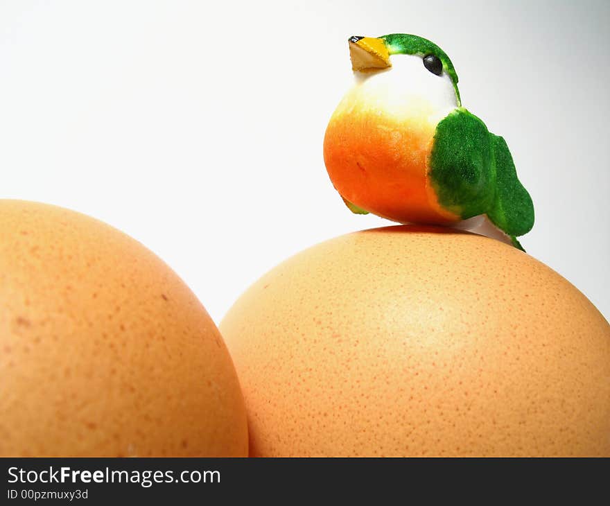 Easter still life with little bird and two eggs