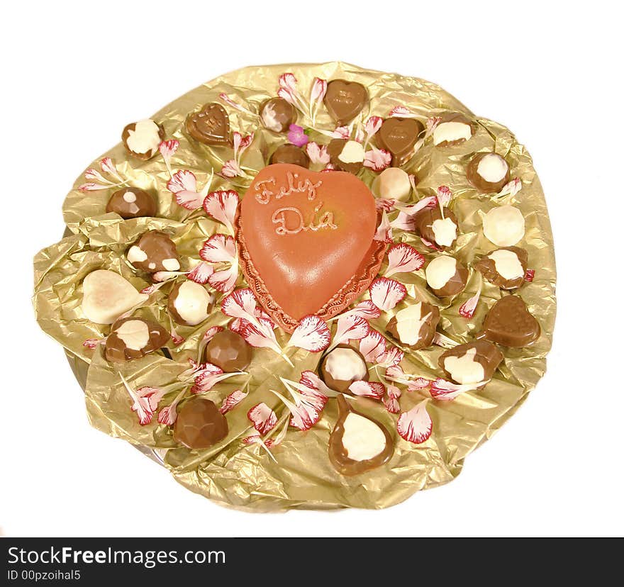 Valentines day cake in the shape of a heart with homemade chocolate pralines. Valentines day cake in the shape of a heart with homemade chocolate pralines