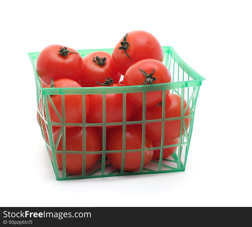 Cherry tomato basket isolated on white. Cherry tomato basket isolated on white.