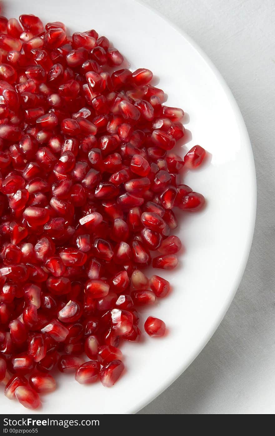 Pomegranate Seeds On The Plate