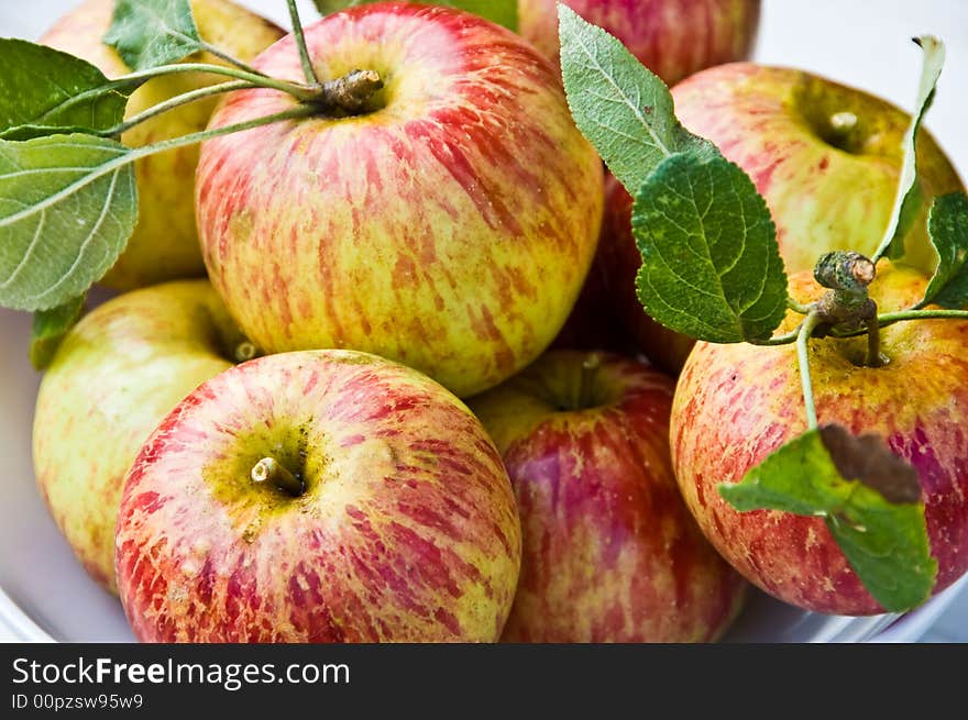 Shiny ripe delicious apples stacked. Shiny ripe delicious apples stacked