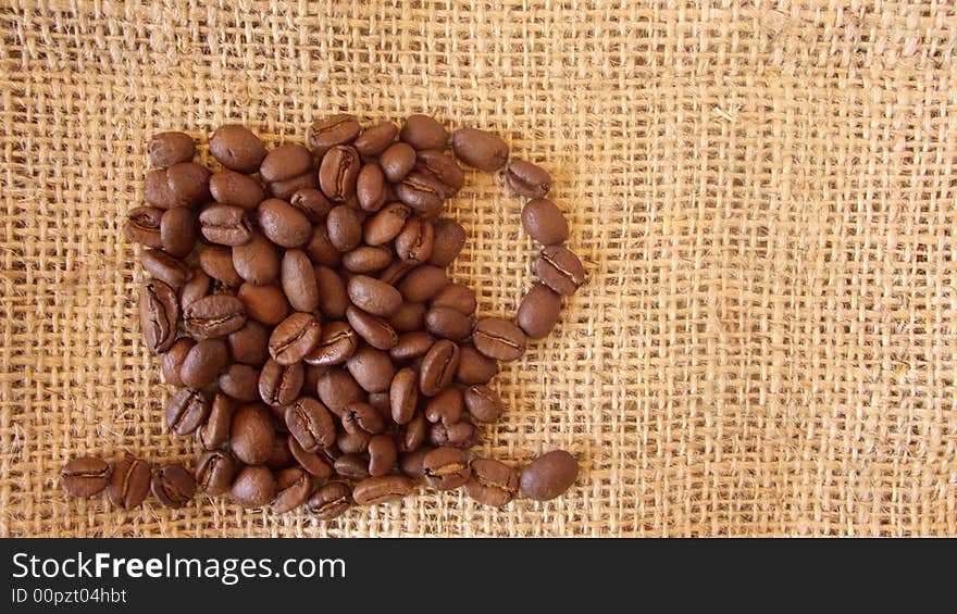 Cup of coffee designed out of coffee beans. Cup of coffee designed out of coffee beans