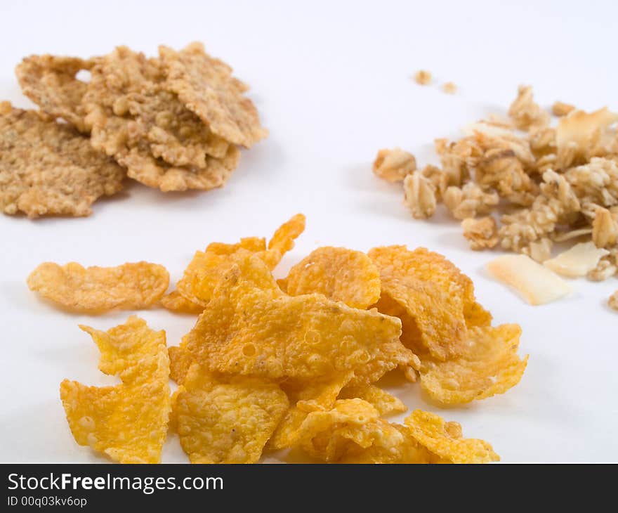 Separate files of wheat, corn flakes and muesli