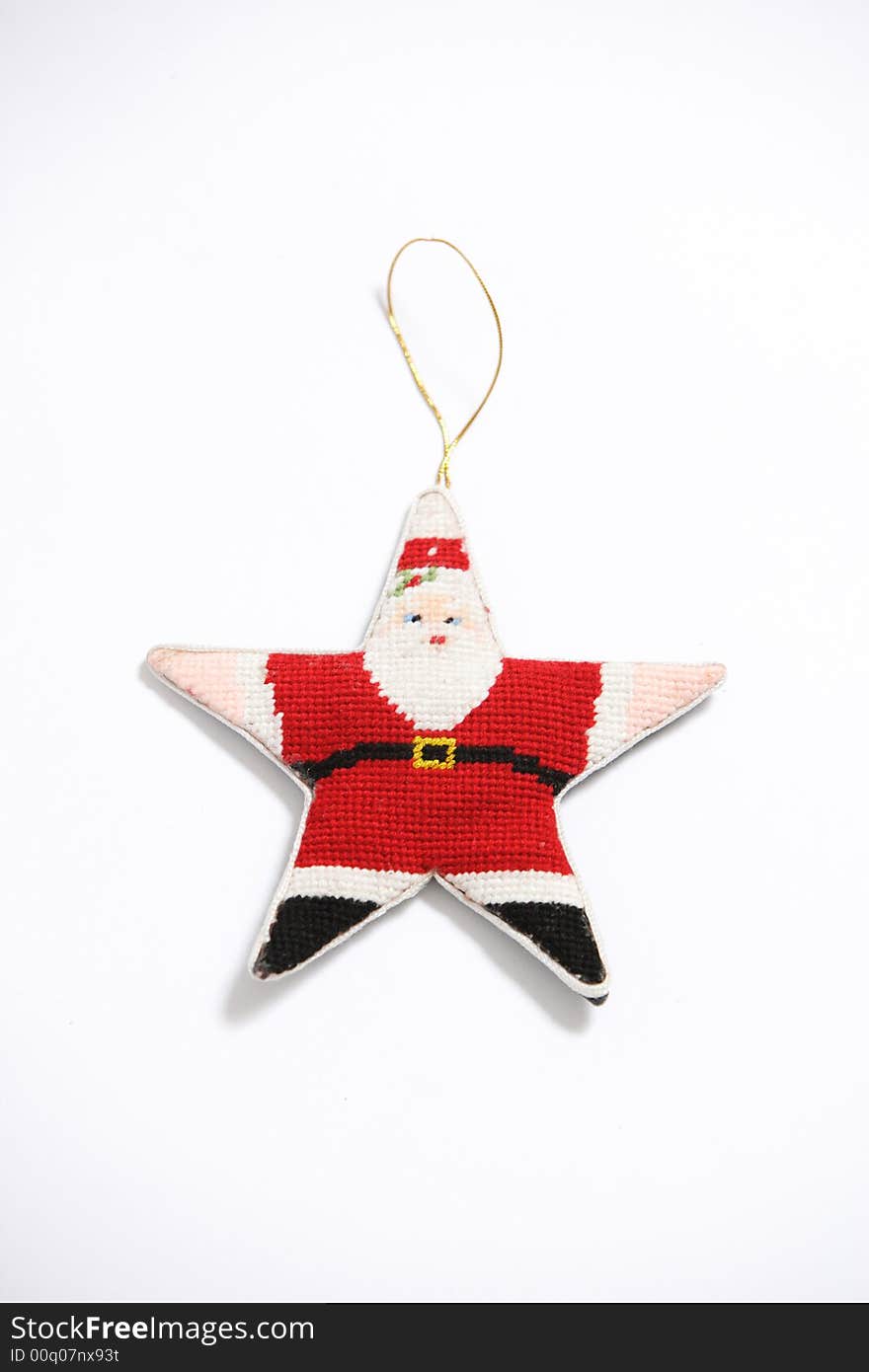 A Christmas Ornament in the shape of a Star Santa. A Christmas Ornament in the shape of a Star Santa