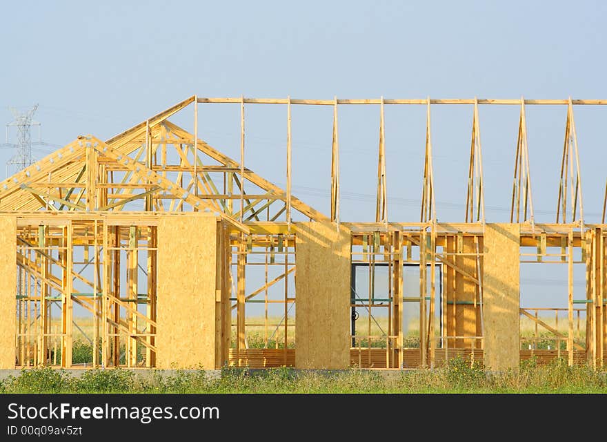 New house frame under construction. New house frame under construction