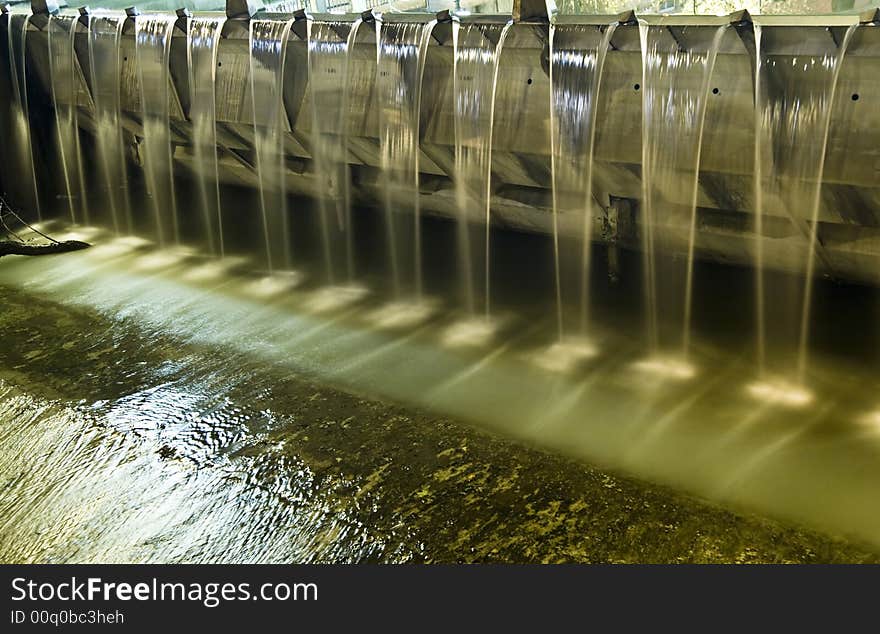 Water falling from iron dam. Water falling from iron dam.