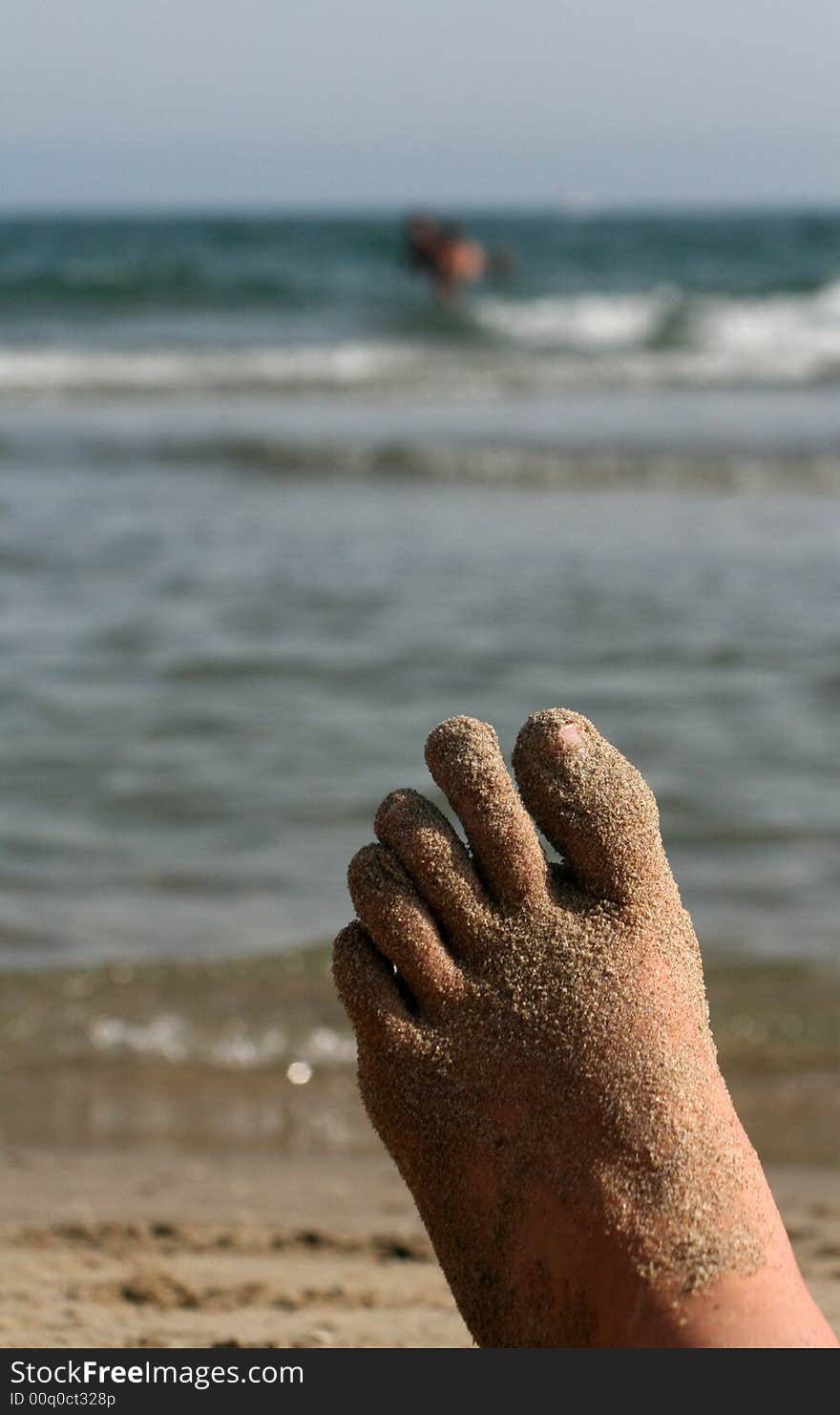 Sandy foot by the sea. Sandy foot by the sea