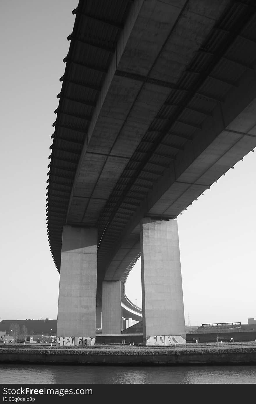 Viaduct over water in black and white colors