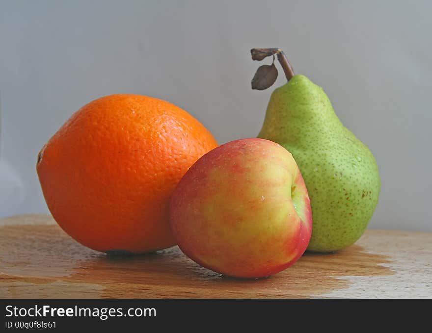 Trio of fruits on a white background