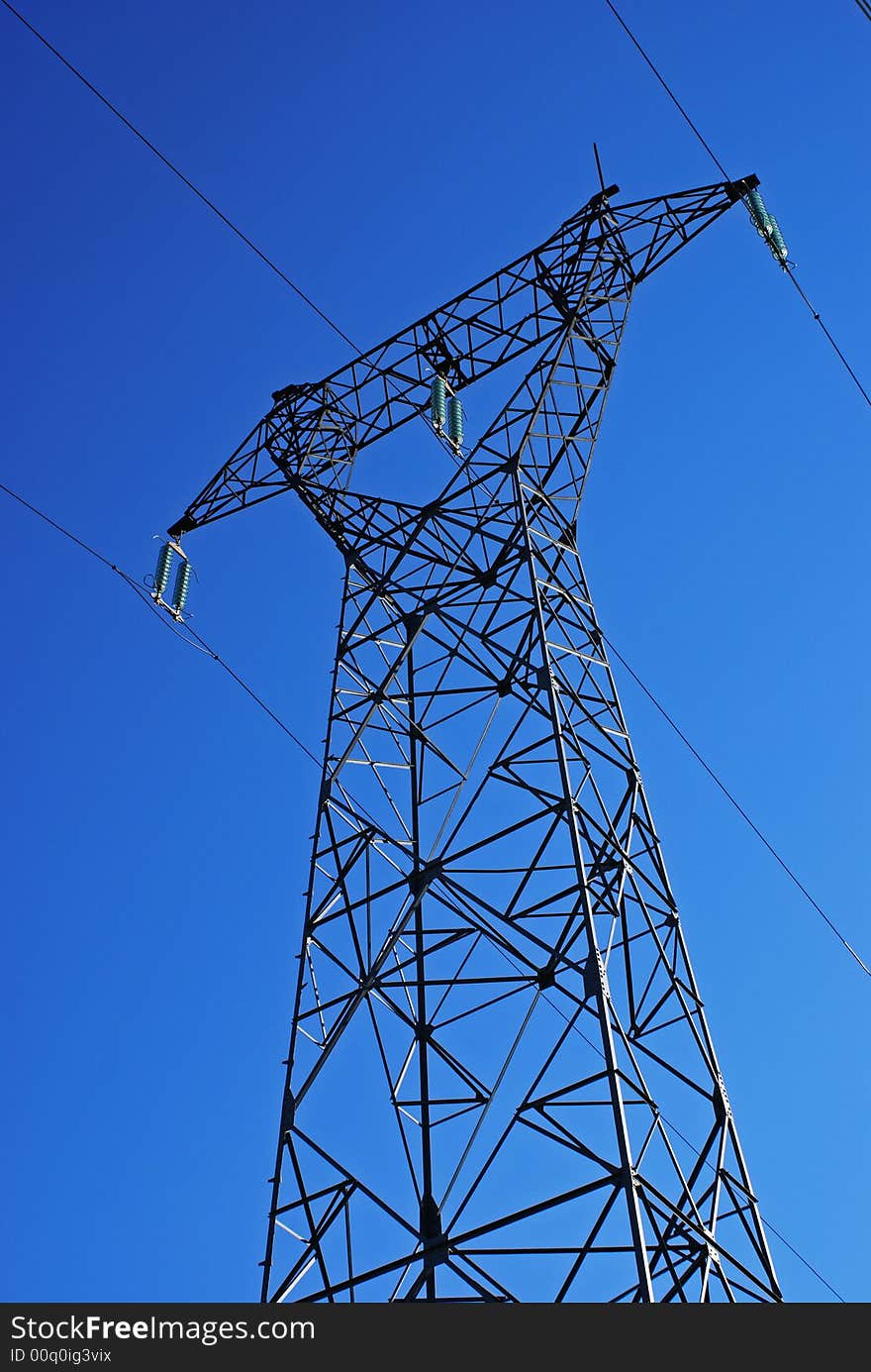 French electricity transportation over a blue sky. French electricity transportation over a blue sky