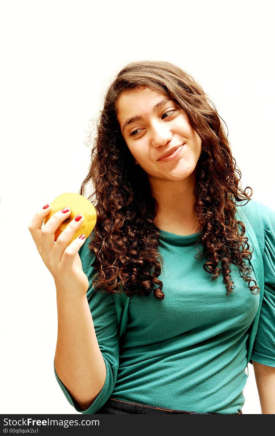 A pretty lady whit an green apple for her diet. A pretty lady whit an green apple for her diet.