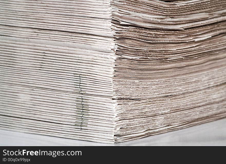 Pack of newspapers, view from the corner.