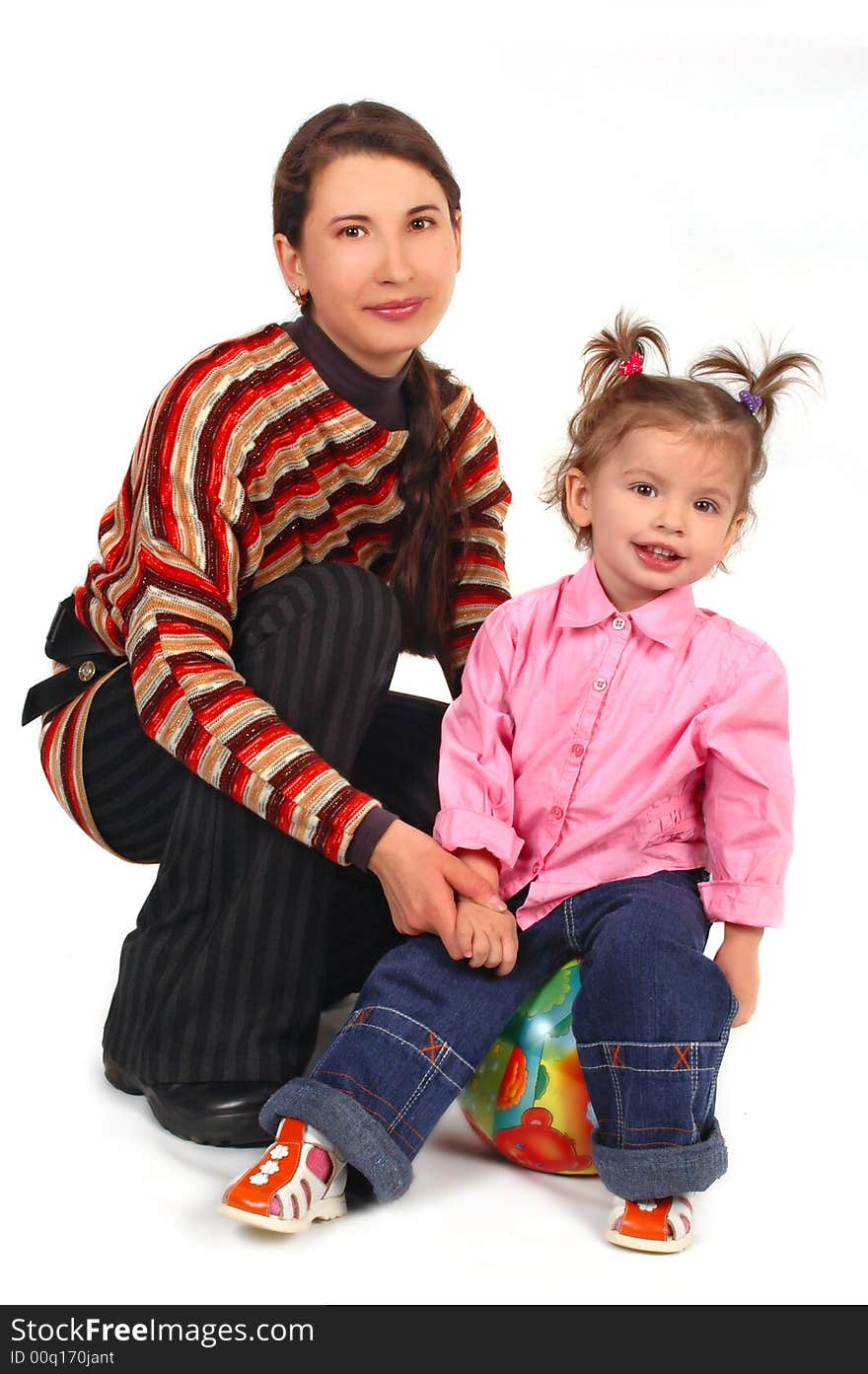 Mother playing with daughter on white background. Mother playing with daughter on white background