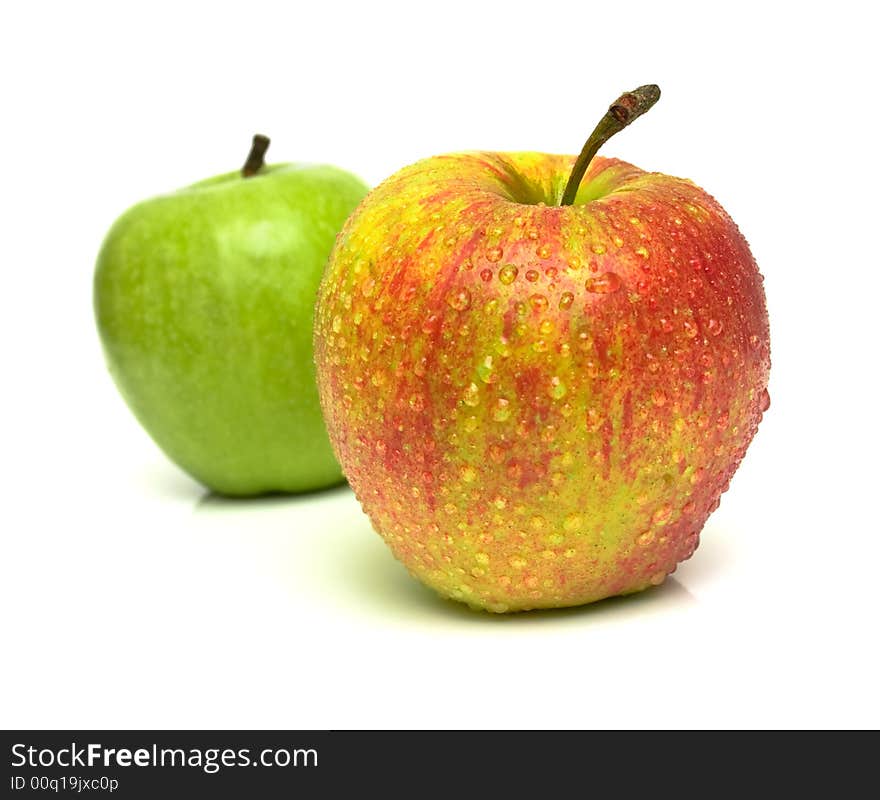 Red and green apple. Shallow DOF. Focus on a red apple.