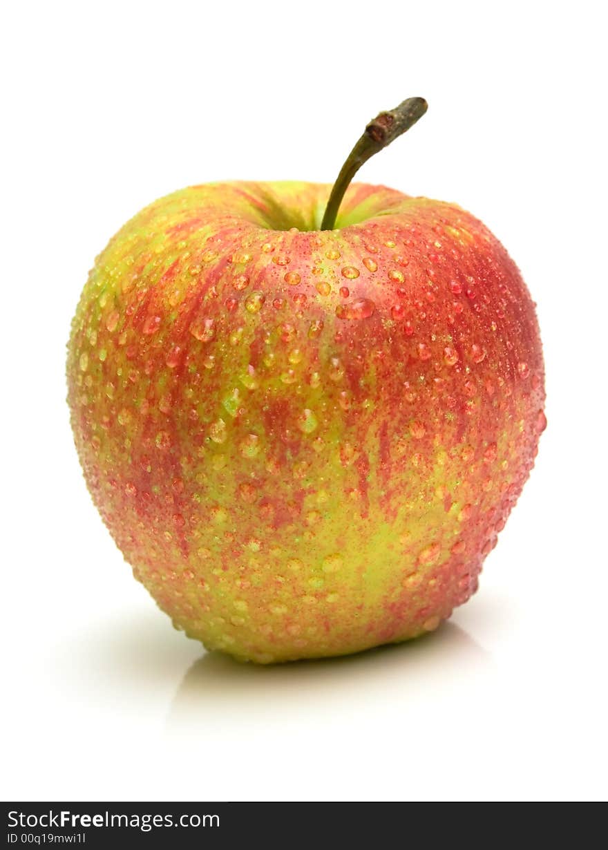 Red apple with water drops on the white background. Isolated. Shallow DOF.